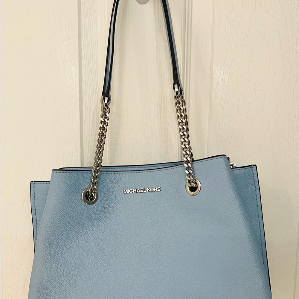 Michael Kors satchel. Light Blue. Used in excellent condition. 3 pockets